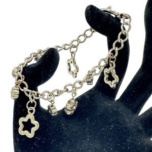 Silver toned floral‎ with star charm bracelet